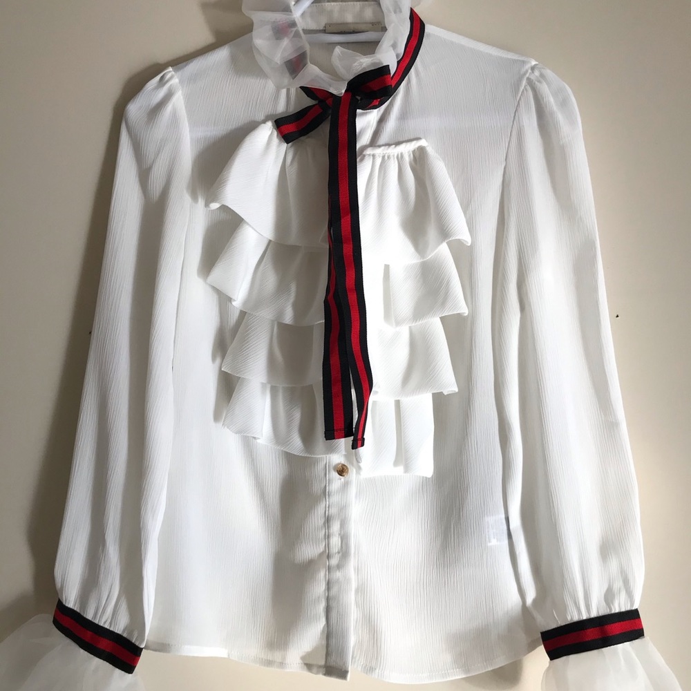 Ruffle blouse with blue & red ribbon